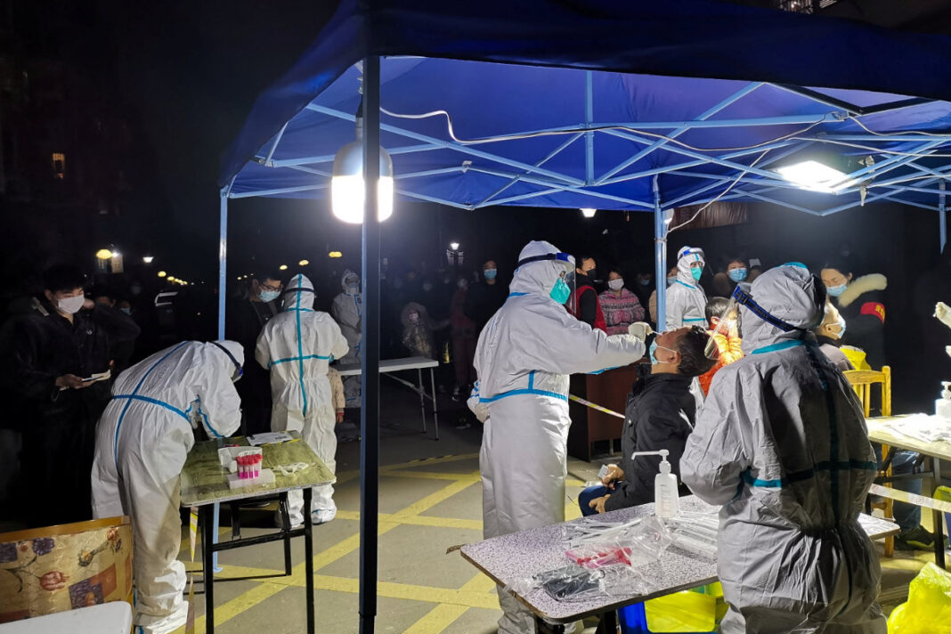 China locks down city of 1.2 million after three virus cases