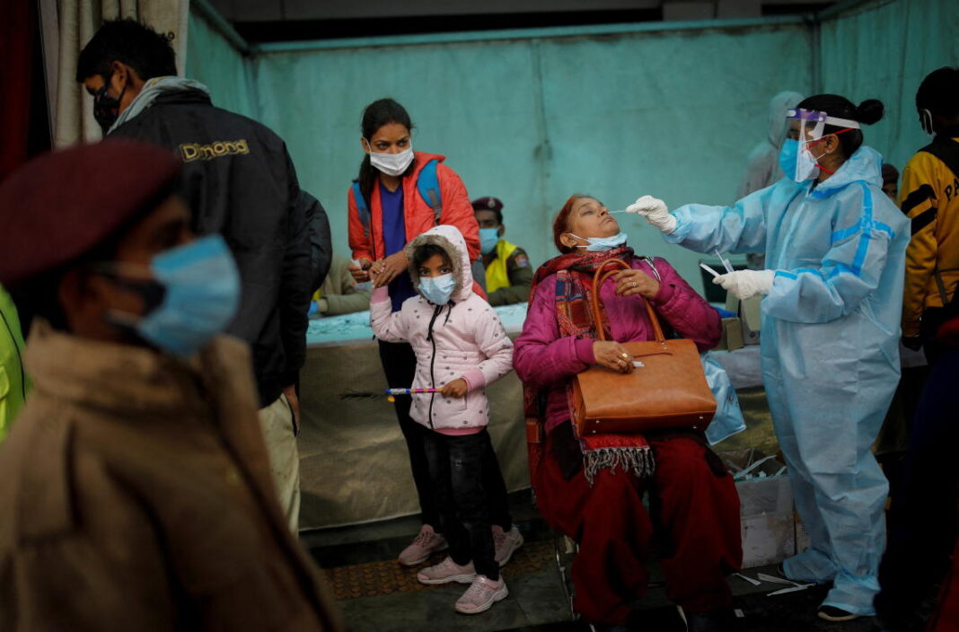 Omicron spreads in India's big cities but hospitalizations still low