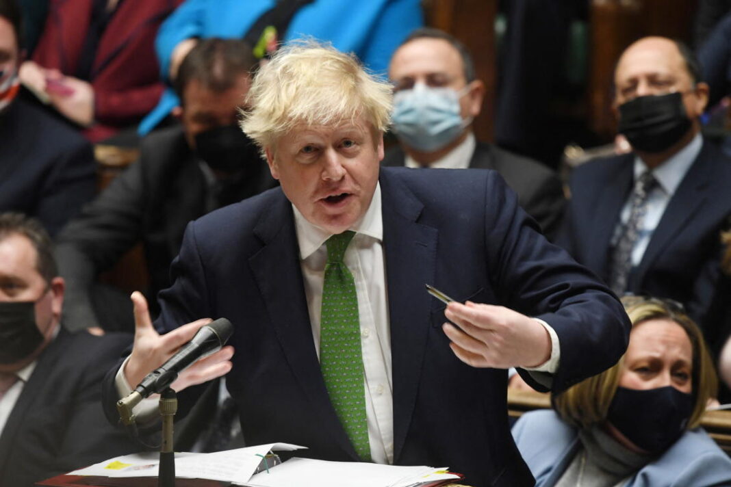 Betting omicron has peaked, PM Johnson drops COVID rules in England