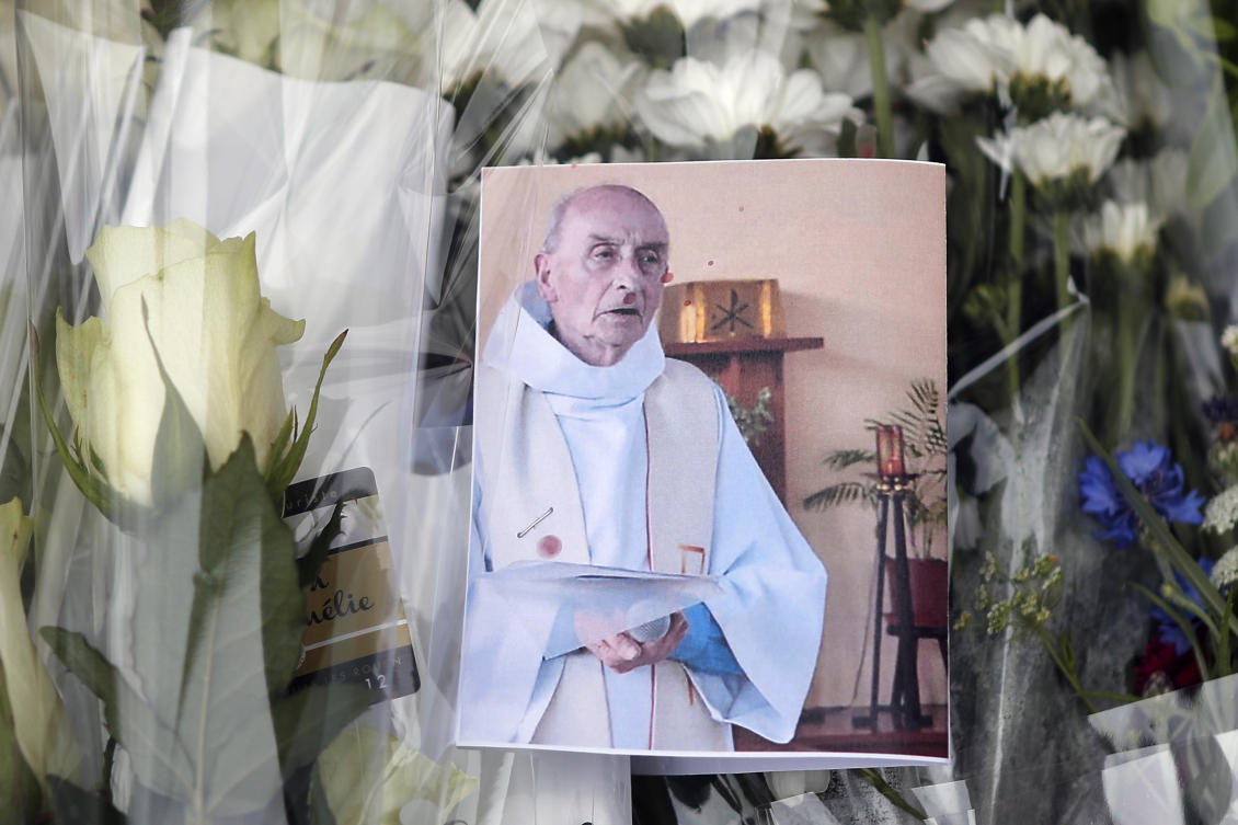 Four go on trial over militant murder of French priest